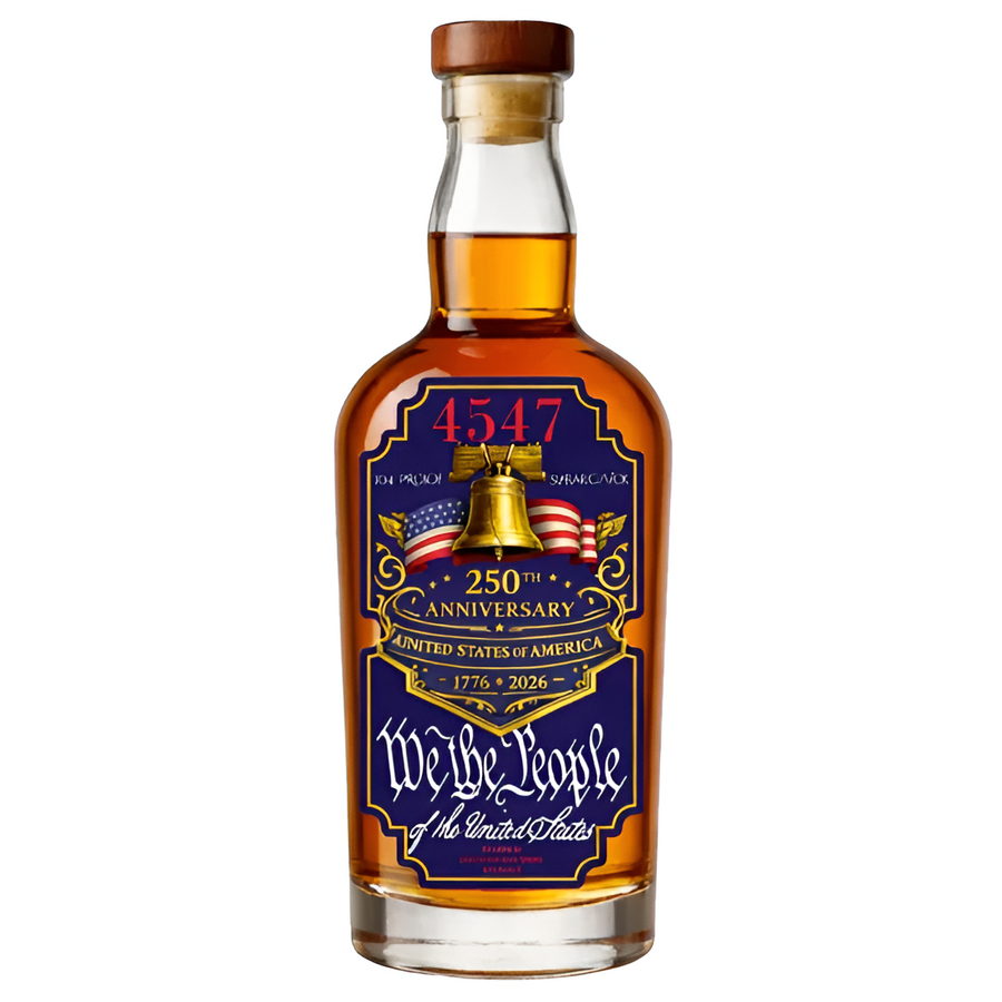 Bourbon whiskey bottle with amber liquid, gold cap, and 4547 anniversary label