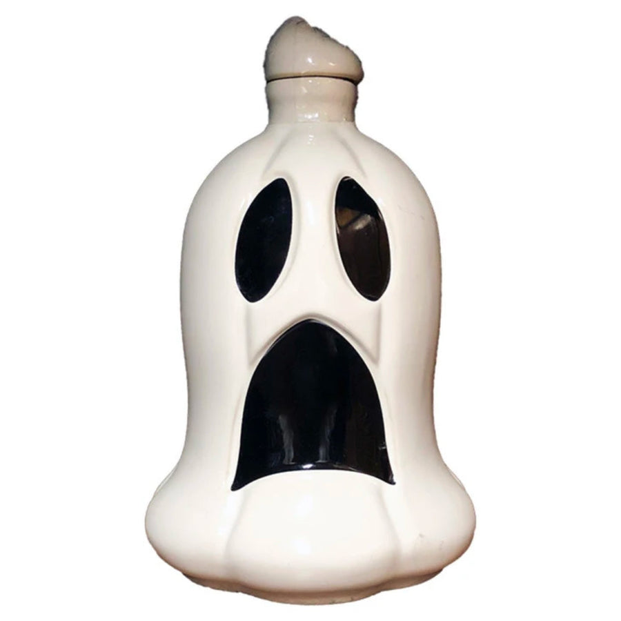 Ghost-shaped bottle with white ceramic finish and dark eyes, mouth.
