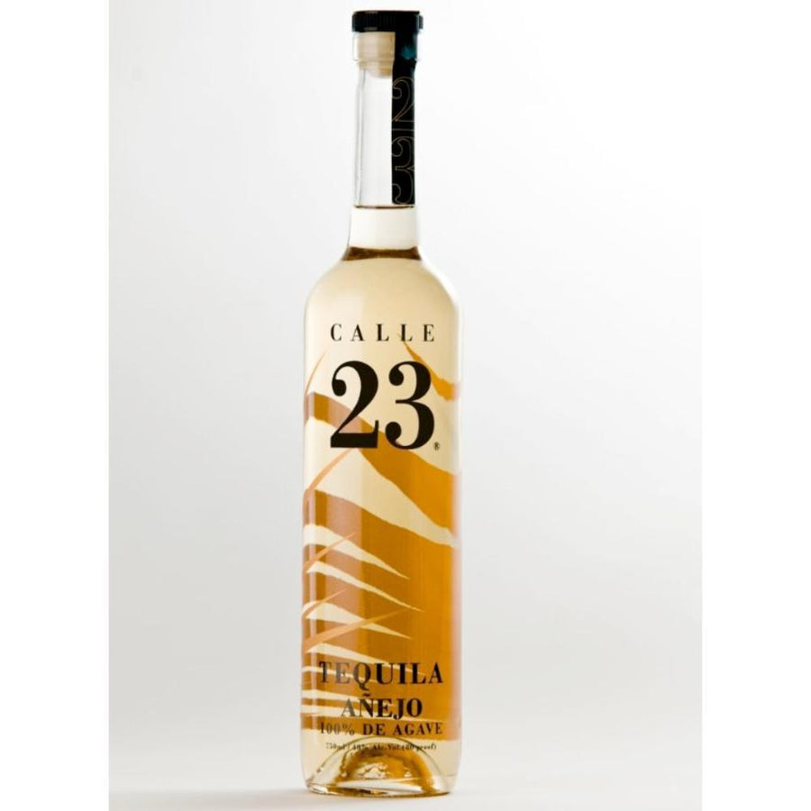 Calle 23 Añejo tequila bottle with gold label