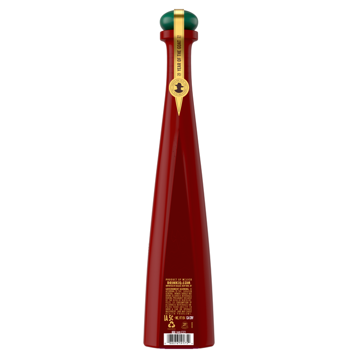 Don Julio 1942 tequila anejo bottle, red with gold label and green cap