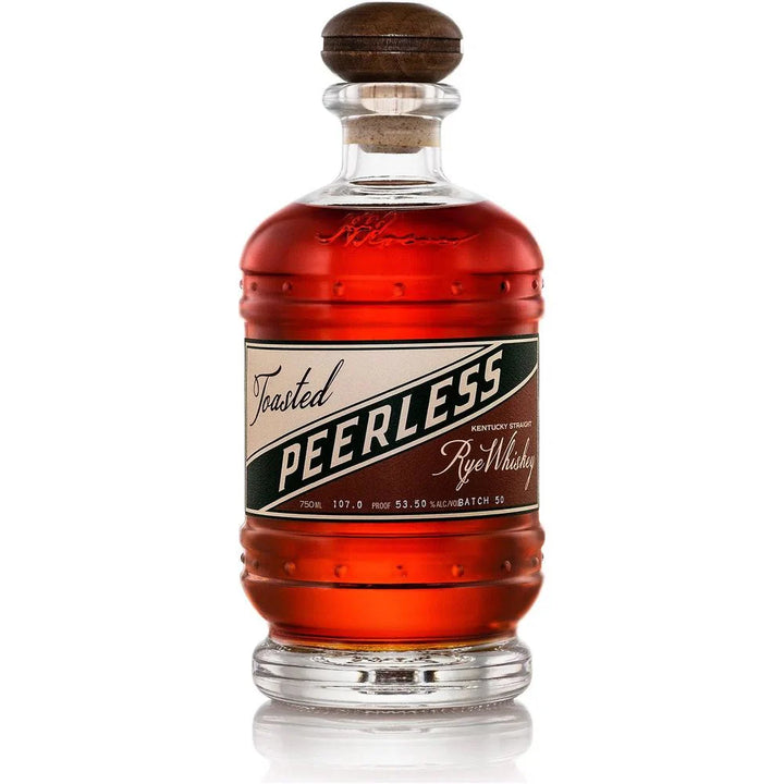 Toasted rye whiskey bottle with red amber glass and Peerless label
